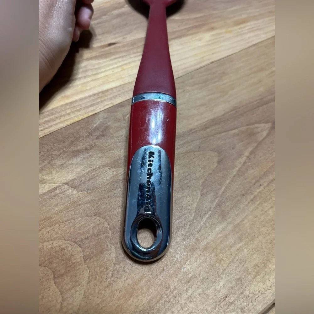 KitchenAid Red Slotted Spoon with Silver Detail